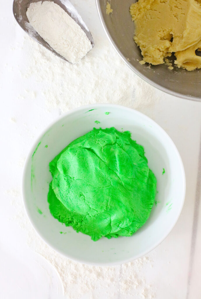 green cookie dough in white bowl