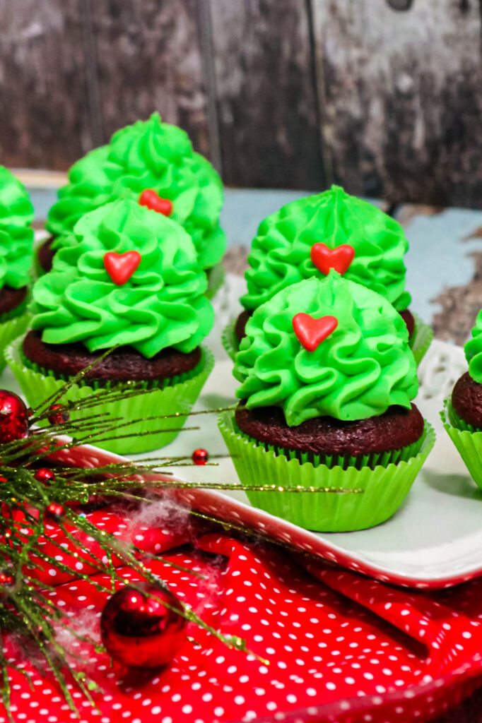 tray full of homemade grinch cupcakes