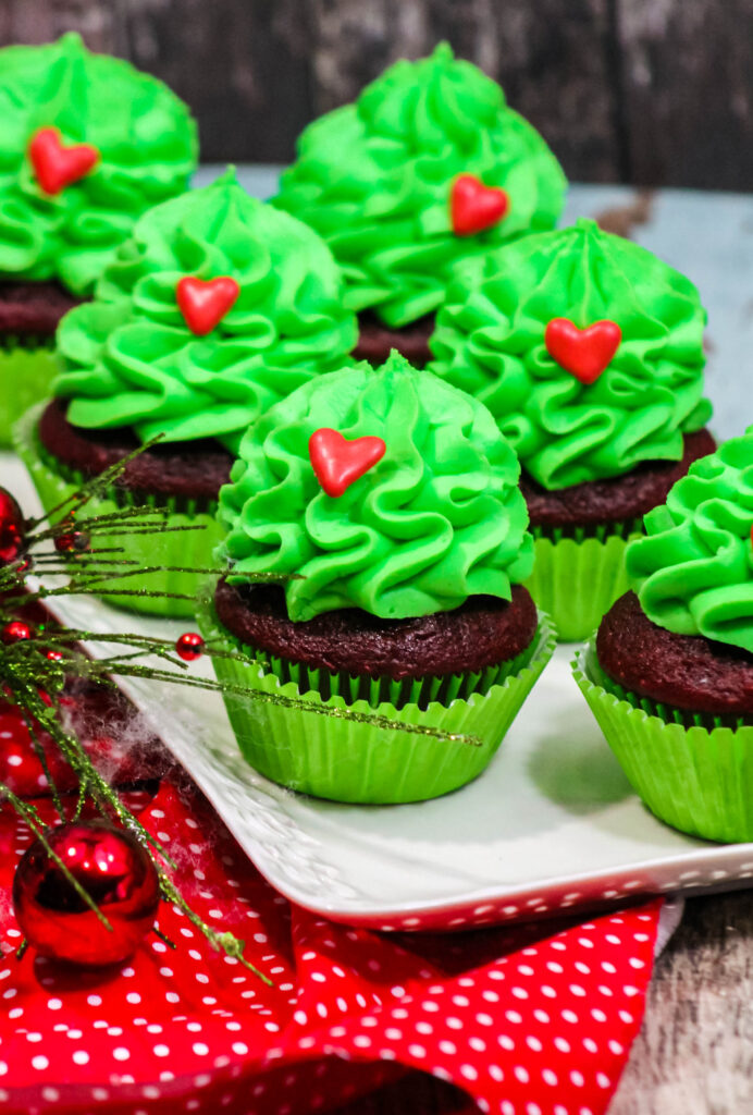 grinch cupcakes on white tray