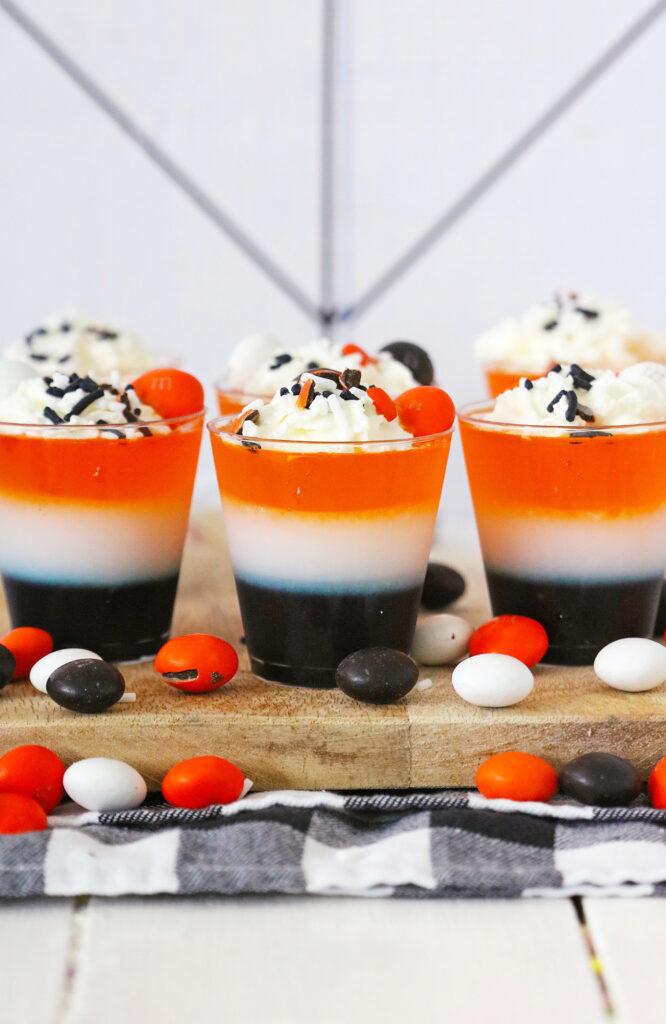 colorful halloween jello shots on a serving tray