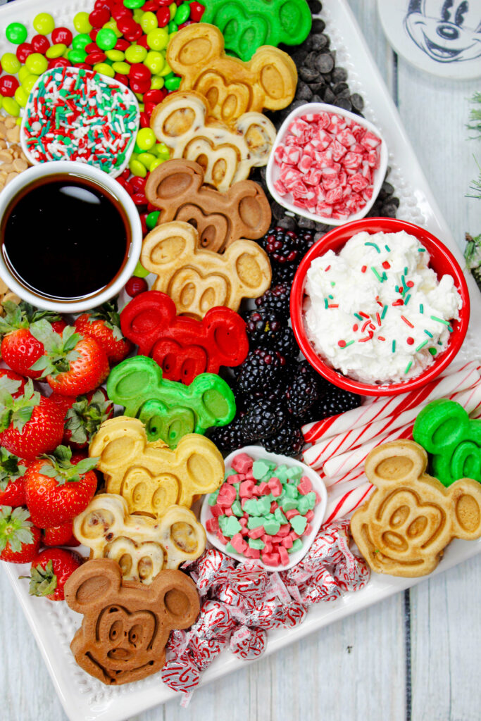 colorful Christmas mickey mouse charcuterie board