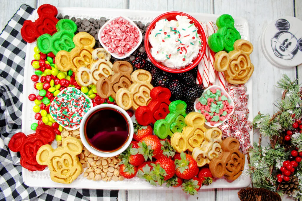 a tray of Christmas Mickey Mouse Charcuterie Board