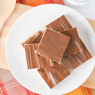Overhead view of peanut butter bars on a plate.
